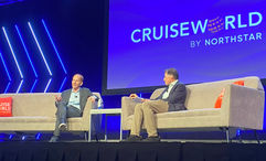 Norwegian Cruise Line Holdings CEO Harry Sommer, left, and Travel Weekly editor in chief Arnie Weissmann on stage at the 2024 CruiseWorld show.