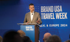 Fred Dixon, CEO of Brand USA, speaking at the organization's Travel Week event in London in October.
