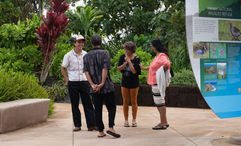 Visitors chat during the opening ceremont at the Hanalei National Wildlife Refuge Viewpoint.