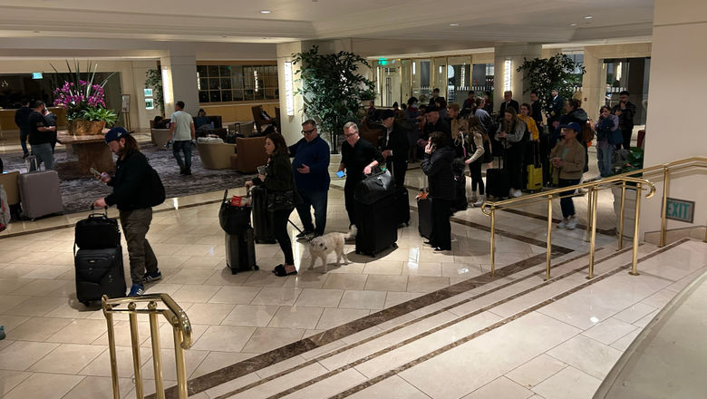 The line for check-in at the Hilton Los Angeles Airport on Jan 8. Airbnb has announced that it is offering free, temporary housing for people who have been displaced by the Los Angeles wildfires.