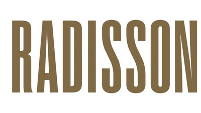 The redesigned Radisson logo features a bold, elongated typeface, which pays homage to the 115-year-old brand’s original hotel signage.