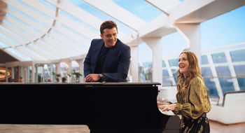 A scene from an MSC Cruises "Let's Holiday" ad, starring Orlando Bloom and Drew Barrymore.