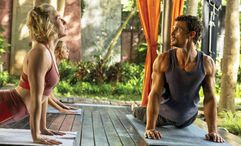 A wellness-related scene from season three of "The White Lotus," featuring Laurie (played by Carrie Coons) and her "health mentor," Valentin (played by Arnas Fedaravicius).