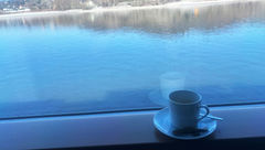 The enclosed balcony on the Emerald Luna is the best spot to enjoy a cup of tea or coffee as we float down the Danube.