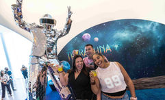 Guests celebrate the grand opening of Universal Orlando Resort's Universal Terra Luna Resort on March 25.