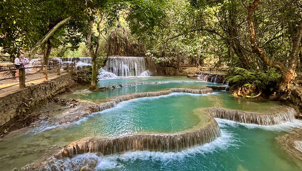 Turquoise pool of Kuangsi Waterfall Park.