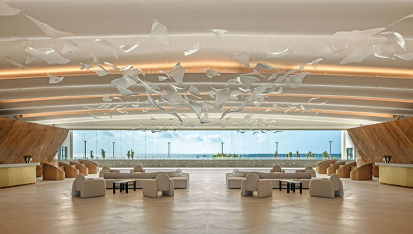 An airy lobby connects the two wings of the all-inclusive resort. An airy lobby connects the two wings of the all-inclusive resort.