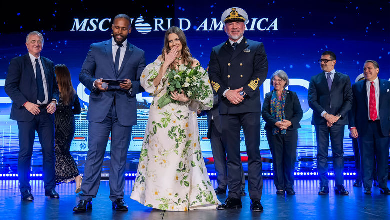 From left, cruise director Everson Bevelle, ship godmother Drew Barrymore and Capt. Dino Sagani at the christening of the MSC World America in Miami on April 9.