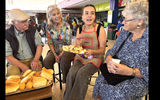 Guide Sara Fernandez shares antojitos during a tour of Bogota's Paloquemao market.