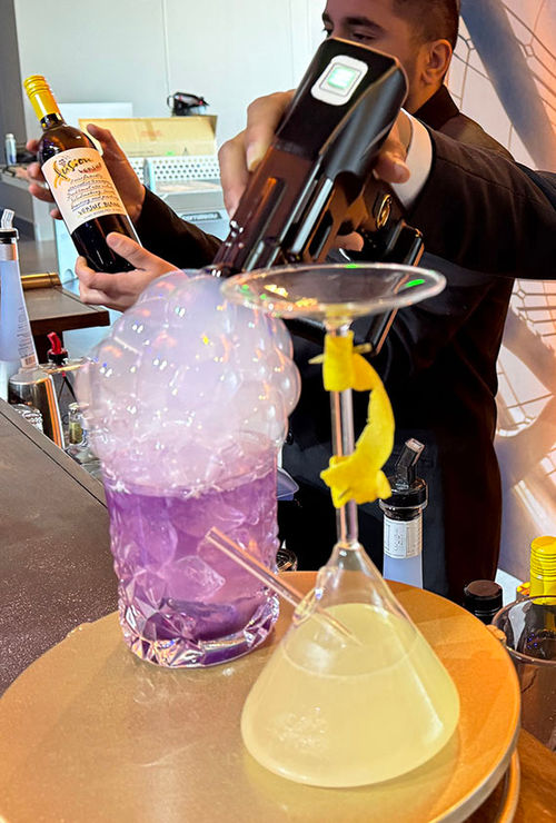 Drinks to be served at Sanctum: The bubbly Vapors of Valtorr and Circle of the Cosmos, served in an upside-down martini glass. Drinks to be served at Sanctum: The bubbly Vapors of Valtorr and Circle of the Cosmos, served in an upside-down martini glass.