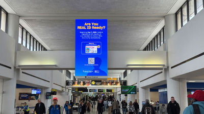 A digital display at Newark Airport warned travelers that Real ID-enabled driver's licenses will be required as of May 7.