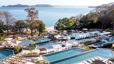 Perched cliffside, the Waldorf Astoria Costa Rica Punta Cacique features a multilevel pool.
