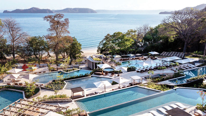 Perched cliffside, the Waldorf Astoria Costa Rica Punta Cacique features a multilevel pool.