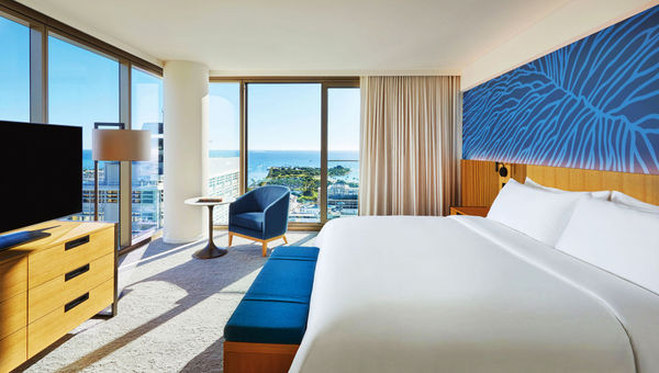 A Premier King Ocean View residence with floor-to-ceiling windows, some of which can be opened to let in ocean breezes. A Premier King Ocean View residence with floor-to-ceiling windows, some of which can be opened to let in ocean breezes.