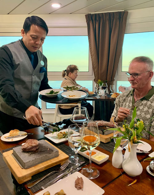 Diners at the Tuscan Stone Grill cook their steaks on individual hot stones. Diners at the Tuscan Stone Grill cook their steaks on individual hot stones.