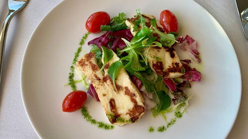 A grilled haloumi appetizer served in the Coastal Dining Room. A grilled haloumi appetizer served in the Coastal Dining Room.
