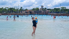 Hotels editor Christina Jelski and her 3-year-old daughter hang out in the Surf Pool at Disney’s Typhoon Lagoon waterpark in Orlando between waves.