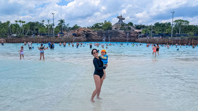 Hotels editor Christina Jelski and her 3-year-old daughter hang out in the Surf Pool at Disney’s Typhoon Lagoon waterpark in Orlando between waves.
