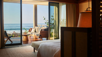 A beachfront suite with terrace at the Rosewood Mandarina.