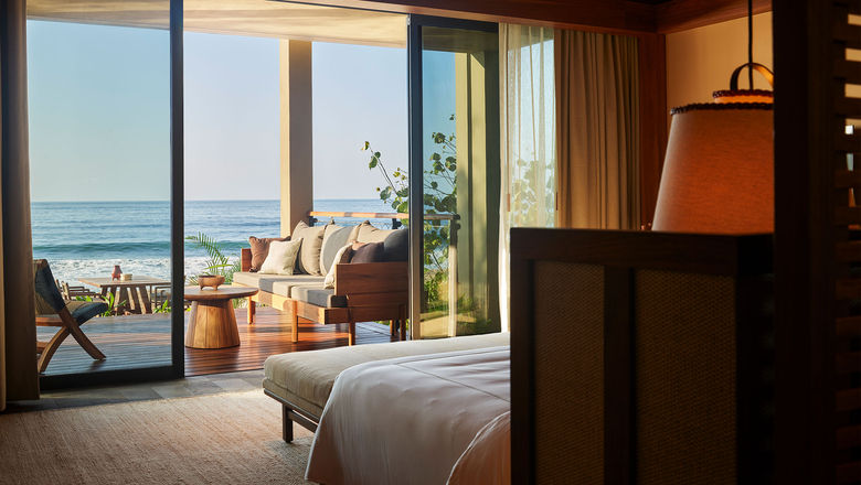 A beachfront suite with terrace at the Rosewood Mandarina.