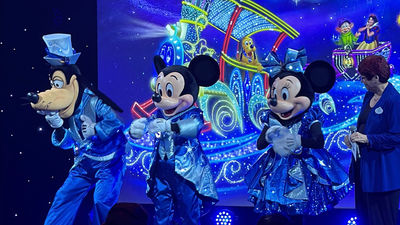 At a May event, Goofy, Mickey and Minnie show off their ensembles for the Disney Starlight: Dream the Night Away parade.