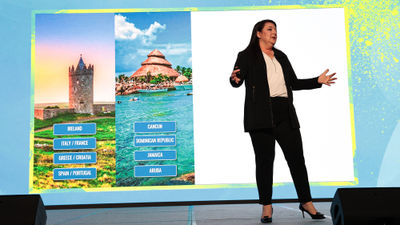 Nicole Mazza, chief marketing officer of American Marketing Group, on stage during Travel Market 2025.
