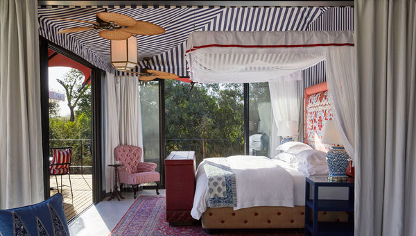 A bedroom with king-size bed at Masiya's Camp, the Royal Portfolio's first luxury tented property. A bedroom with king-size bed at Masiya's Camp, the Royal Portfolio's first luxury tented property.