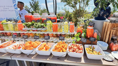 The wide array of toppings in Bora's brunch bloody mary bar include chicken nuggets and bacon donuts.