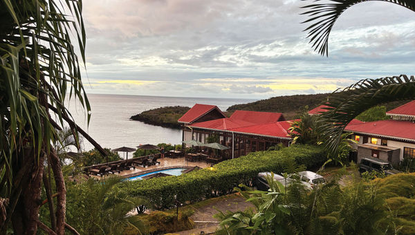 Ti Kaye sits on a cliff overlooking the Caribbean.