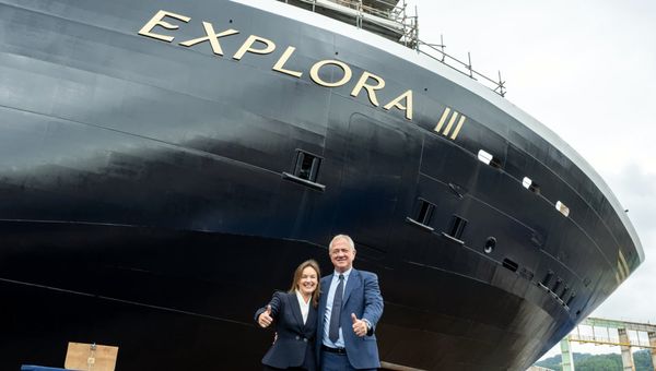 Explora Journeys president Anna Nash and MSC Cruises executive chairman Pierfrancesco Vago in front of the Explora III. Explora Journeys president Anna Nash and MSC Cruises executive chairman Pierfrancesco Vago in front of the Explora III.