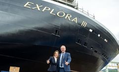 Explora Journeys president Anna Nash and MSC Cruises executive chairman Pierfrancesco Vago in front of the Explora III in Genoa, Italy