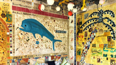 Inspired by dolphins, Ashley B. Saunders has for more than three decades been using found material to enhance his childhood home.