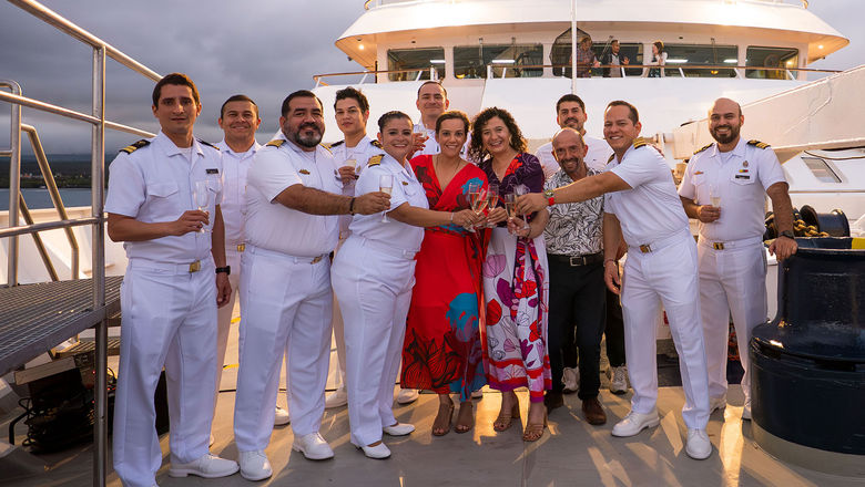 Lindblad Expeditions senior vice president of hotel operations Ana Esteves and CEO Natalya Leahy, center, were joined by senior officers, including the captains of the National Geographic Gemini and Delfina, at the ships' naming ceremony.