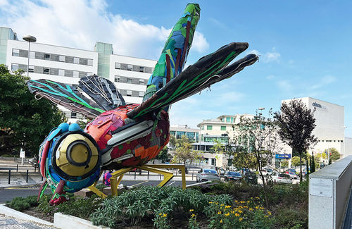 The Plastic Dragonfly sculpture by Portuguese street artist Bordalo II greets guests at the hotel's entrance. The Plastic Dragonfly sculpture by Portuguese street artist Bordalo II greets guests at the hotel's entrance.