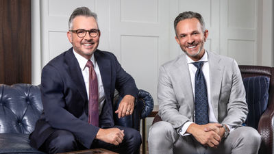 Atlas Ocean Voyages CEO James Rodriguez, left, and executive vice president of global sales Kristian Anderson.