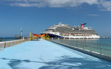 The Carnival Vista docked at the pier that will take guests to Celebration Key.
