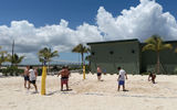 Guests play beach volleyball at Carnival Cruise Line's new Celebration Key private destination in the Bahamas.