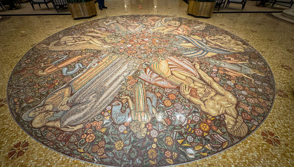 Guests entering the hotel on Park Avenue are greeted by the "Wheel of Life" mosaic by Louis Rigal.