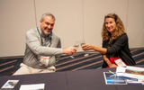 Sam Mosolino of Wishes Travel and Vanessa Seiger of Passport to Dream Vacations toast to a successful GTM Luxury.