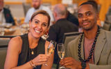 Katharina Heuermann of Titanium Tours and Robert Tate of Grand Wailea, A Waldorf Astoria Resort toast to a successful GTM Luxury.