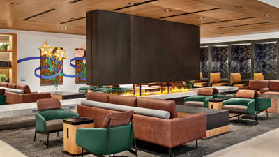 United says its newly reopened United Club on Denver's B Concourse has been renovated to evoke the feeling of a cabin in the Rockies.