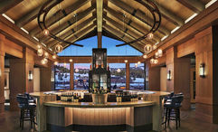 Alpenglow, the primary bar at the Montage Big Sky, has floor-to-ceiling windows, gas fireplaces and is named for the hue of Big Sky sunsets.