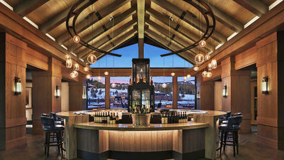 Alpenglow, the primary bar at the Montage Big Sky, has floor-to-ceiling windows, gas fireplaces and is named for the hue of Big Sky sunsets.