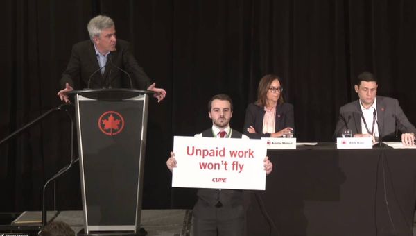 Air Canada flight attendants interrupted an Air Canada press conference on Aug. 14.