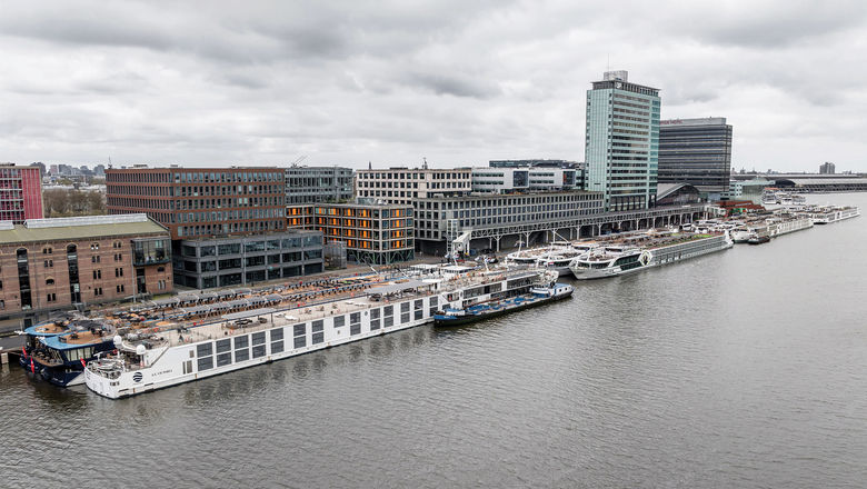 River cruise ships docked in Amsterdam, which is working to reduce the number of calls.