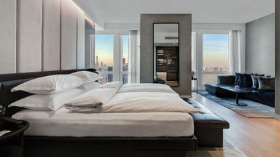 A Premier King Room outfitted with special Sleep Lab features at the Equinox Hotel New York.
