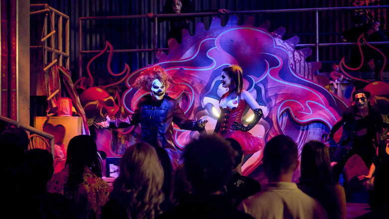 Jack the Clown and sidekick Chance interact with the crowd in Jack’s Alley at Universal Horror Unleashed.