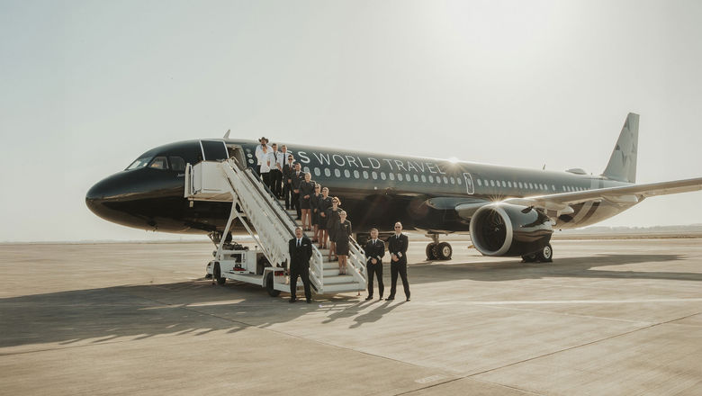 TCS World Travel's Airbus A321 jet and staff.
