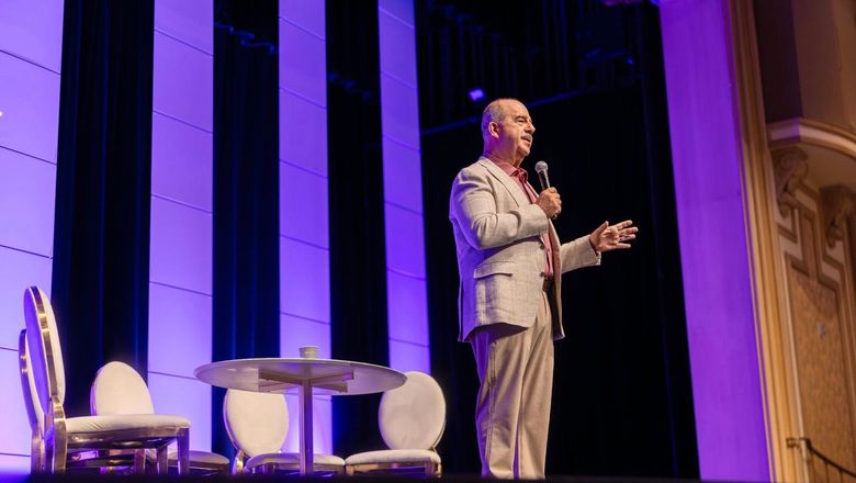 Virtuoso CEO Matthew Upchurch speaking at Virtuoso Travel Week 2025 in Las Vegas.