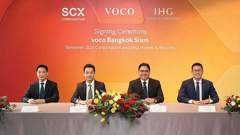 Executives from IHG and hotel developer SCX Corporation commemorate the signing of the Voco Bangkok Siam.